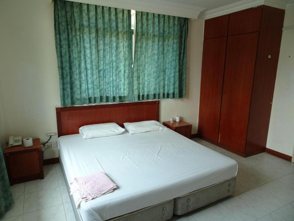 סינגפור Lai Ming Hotel Cosmoland מראה חיצוני תמונה