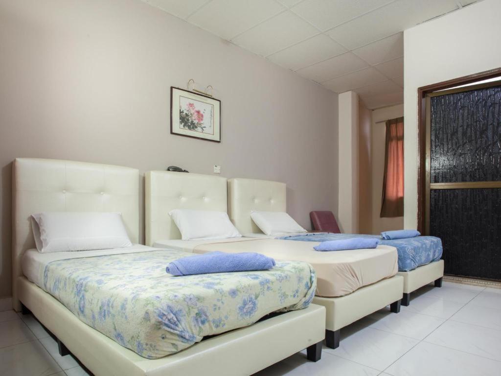 סינגפור Lai Ming Hotel Cosmoland מראה חיצוני תמונה